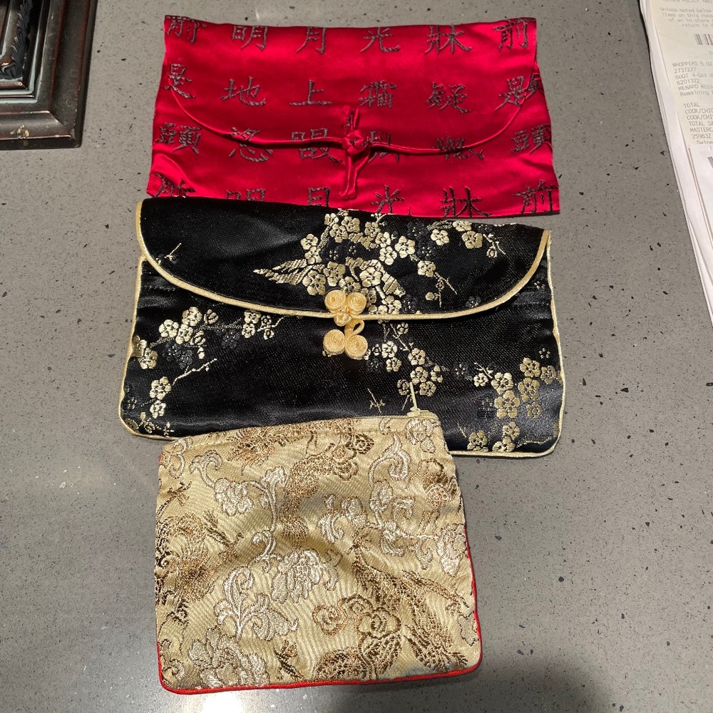 3 never used silk embroidered storage/cosmetic/jewelry bag